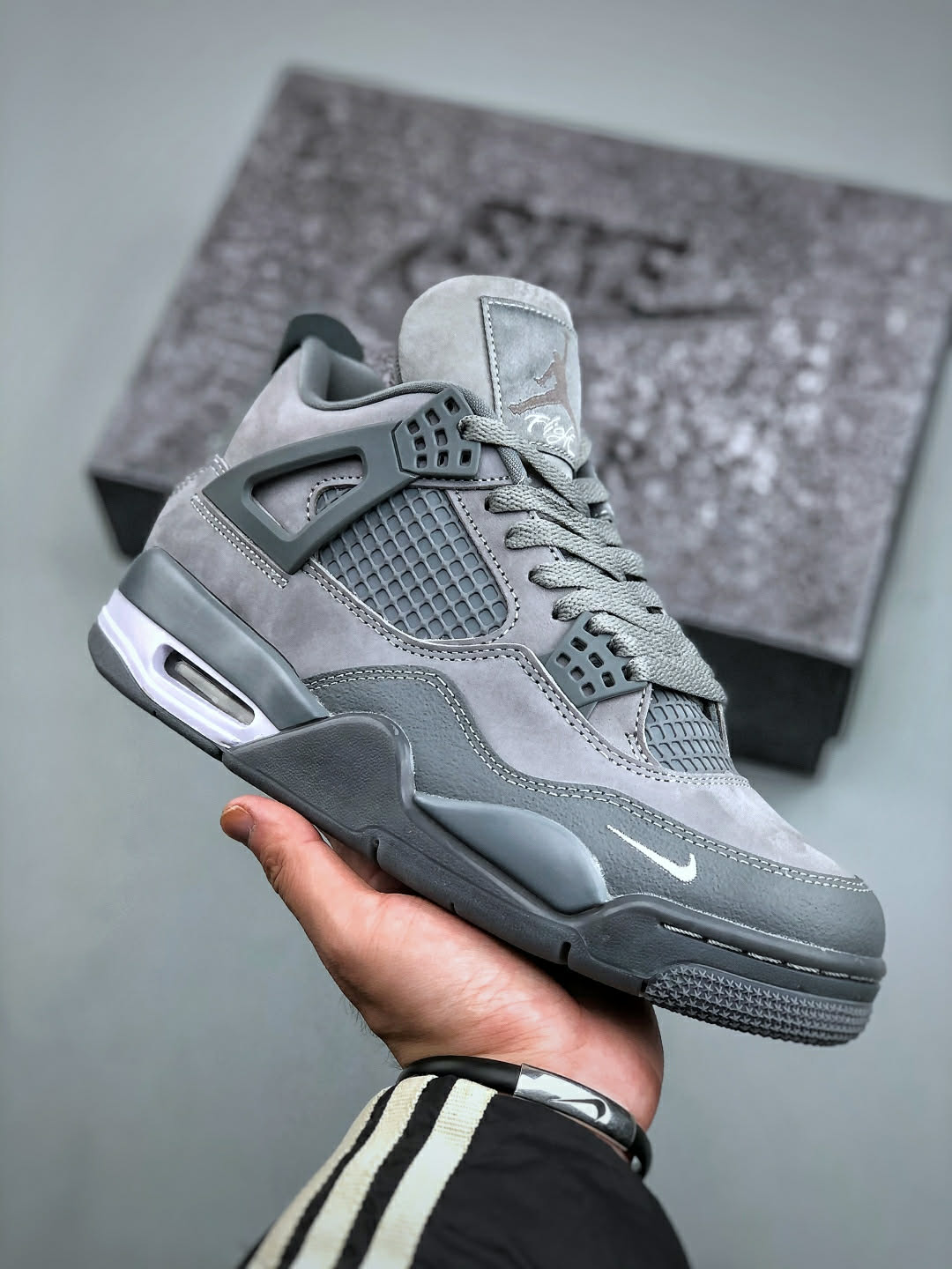 Air Jordan 4 Retro Grey Mini Swoosh